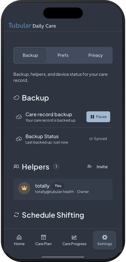 Tubular backup settings: the care record backed up and synced, with a Helpers list and an Invite button to add helpers